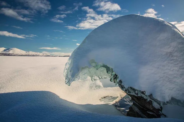Kiruna: Snöskovandring på dagen
