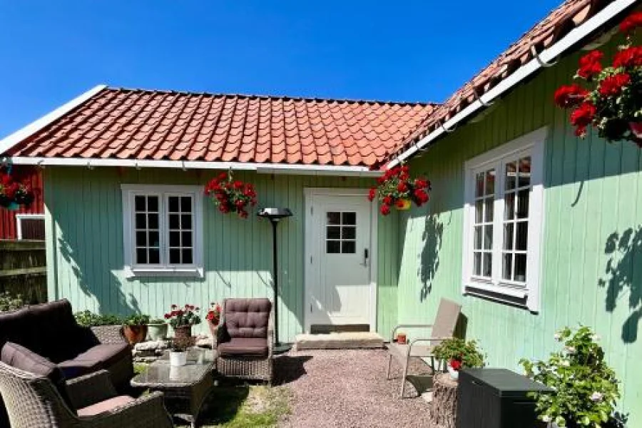 Charmigt gårdshus i hjärtat av Vadstena
